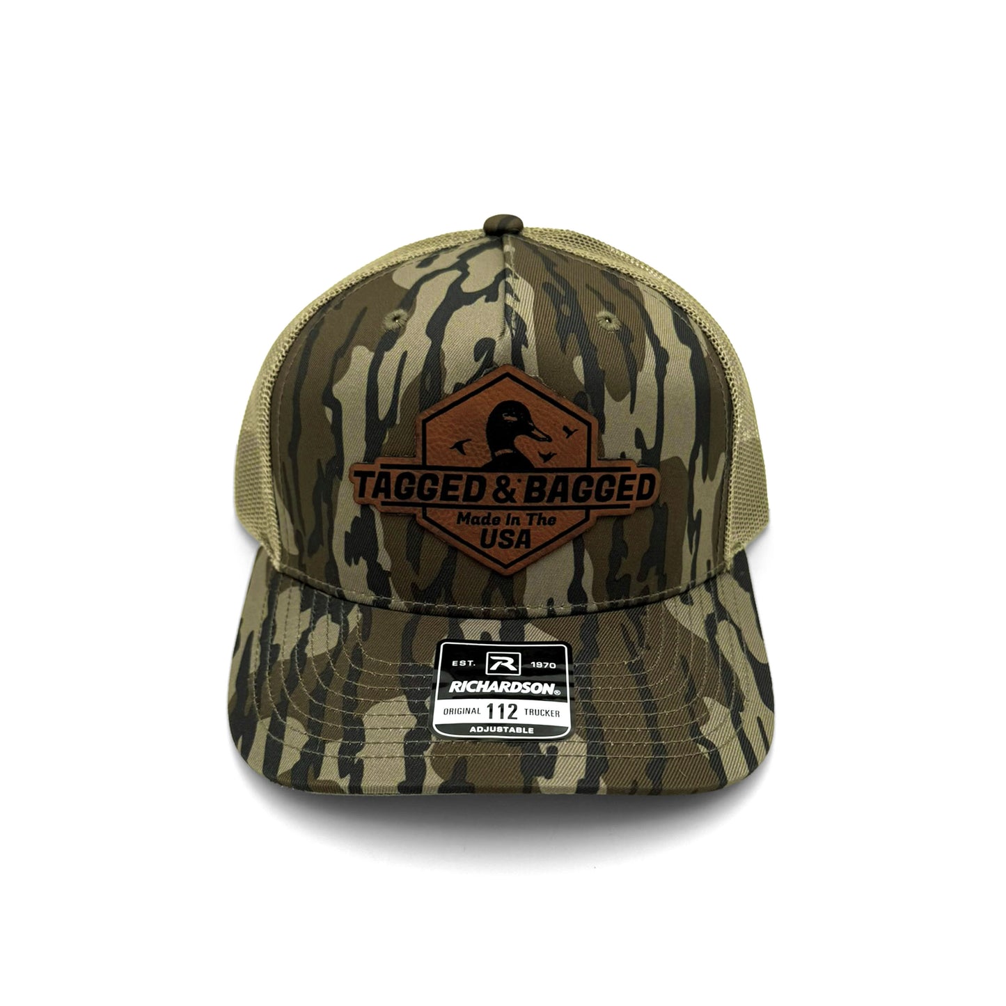 Camouflage cap with 'Tagged & Bagged' logo