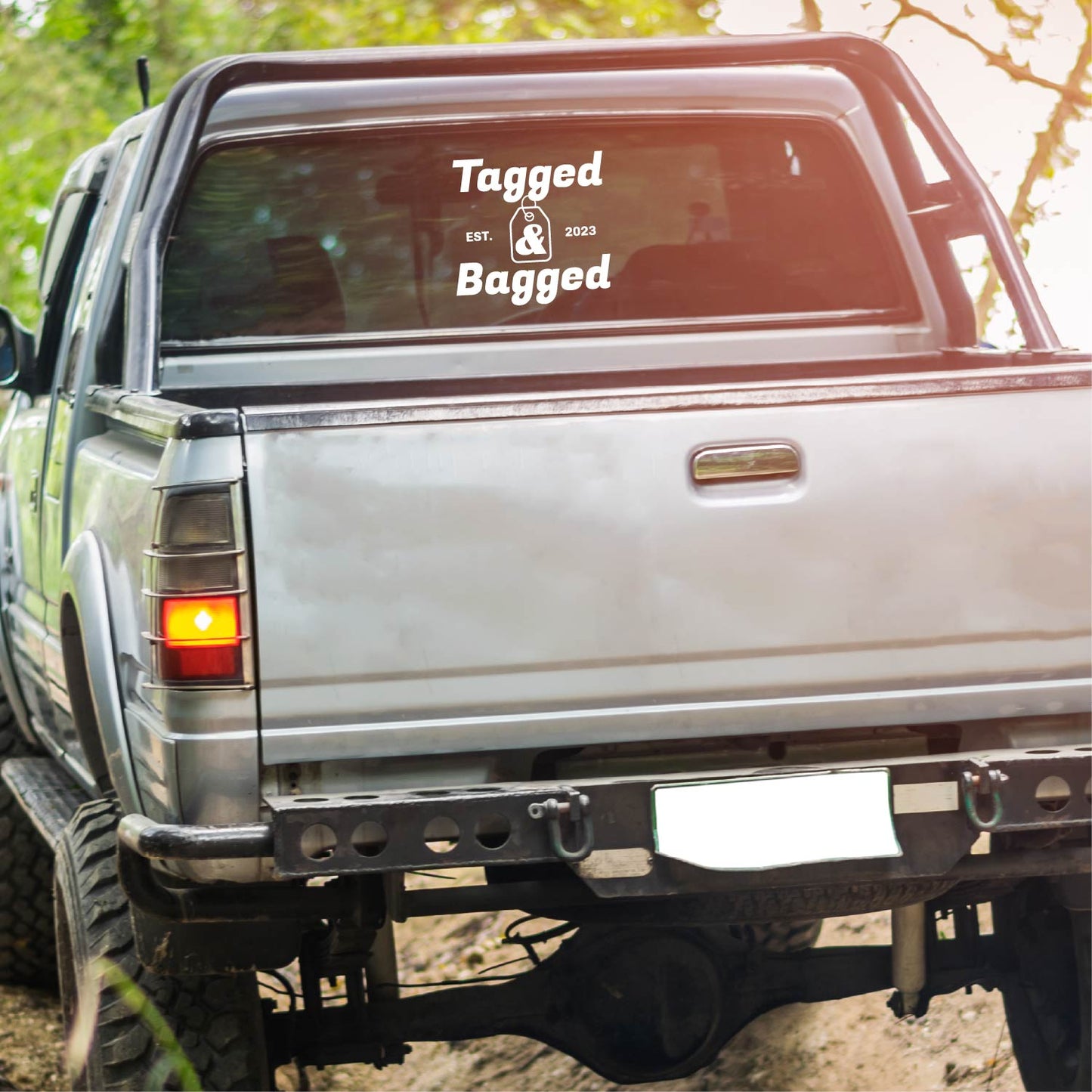 Tagged & Bagged 7"x7" Truck Decal